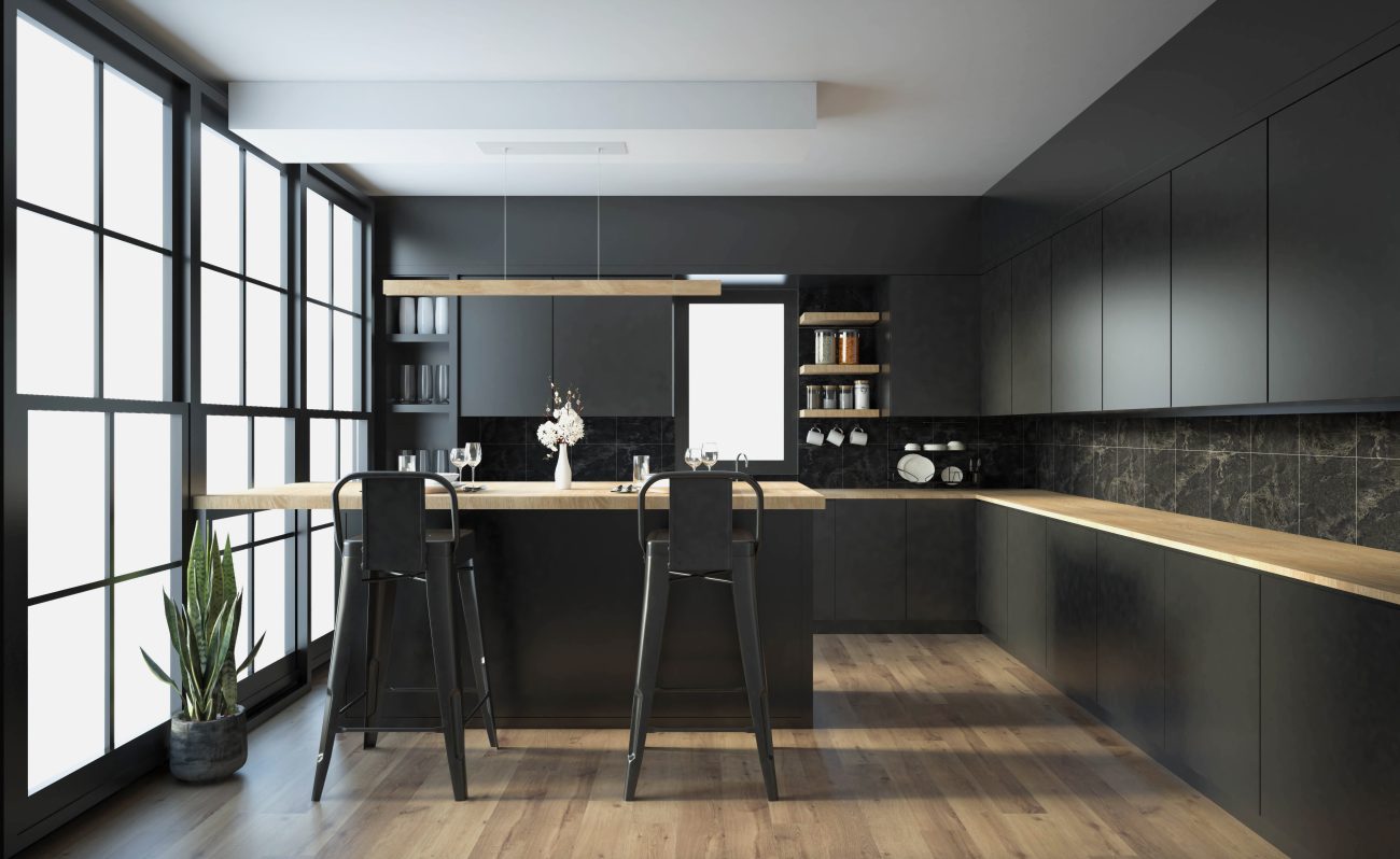 All-black Scandinavian industrial kitchen with pale wood countertop