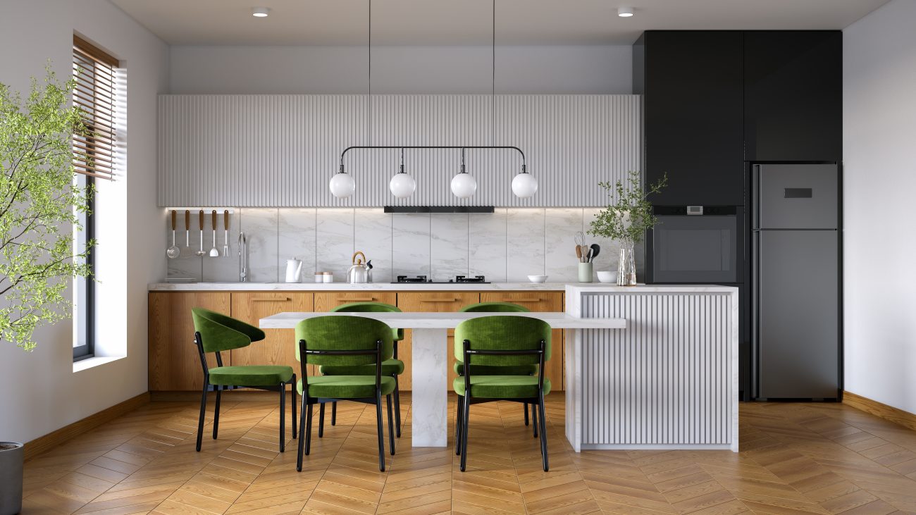 Cuisine scandinave moderne blanche et noire avec tabourets en velours vert, plantes et parquet de bois