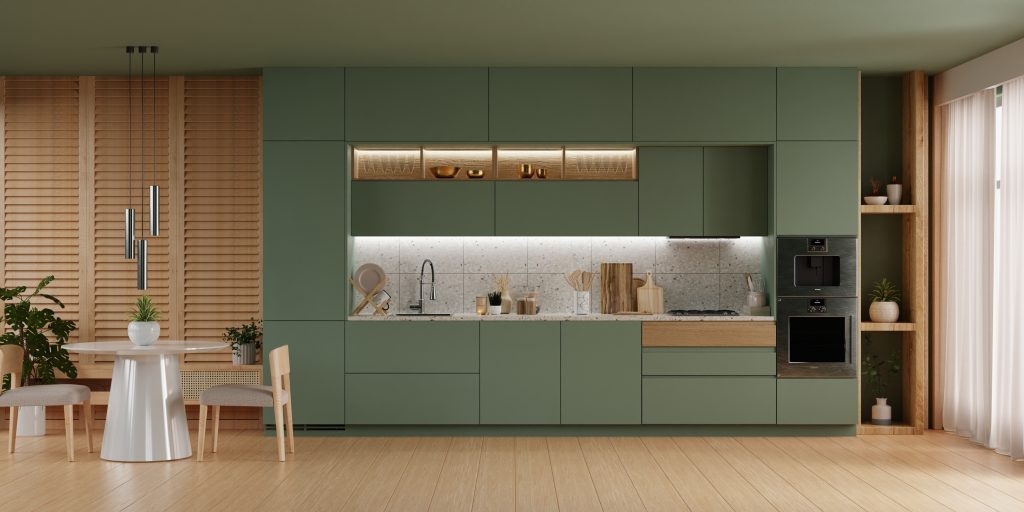 Cuisine design scandinave aux armoires de couleur verte et au plancher de bois pâle 