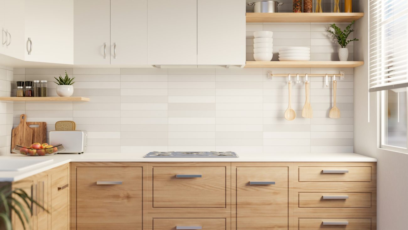 White tiled backsplash, kitchen utensils and accessories on open shelves in a classic kitchen with wooden cabinets